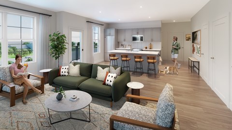 A woman is sitting on a chair in a living room with a couch, a coffee table, and a dog.